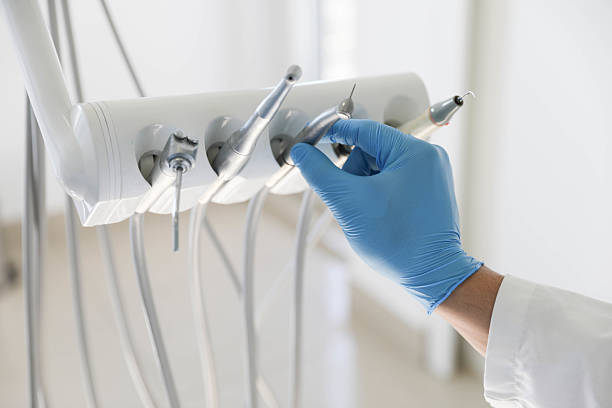 Professional Tooth Extraction technician working in Carbon Cliff, IL